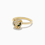 The Signature 18K Yellow Gold Diamond and Tsavorite Panther Ring features a leopard head adorned with white diamonds and two green tsavorite eyes, shown against a plain white background.
