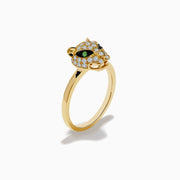 The Signature 18K Yellow Gold Diamond and Tsavorite Panther Ring features a leopard head adorned with white diamonds and two green tsavorite eyes, shown against a plain white background.
