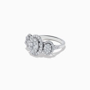 The Bouquet 14k White Gold Diamond Cluster Ring (1.40 TCW) by Effy features a central oval cluster flanked by two smaller round clusters, all set in white gold and shown against a plain white background.