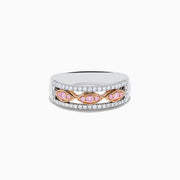 The 14K Two Tone Gold White and Pink Diamond Ring features a wide silver band with a central row of pink marquise stones set in 14K gold, bordered by sparkling white diamonds.