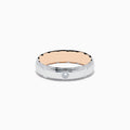 The Mens 14K Two-Tone Gold Diamond Ring features a shiny silver exterior, rose gold interior, and a central round diamond, shown on a plain white background.