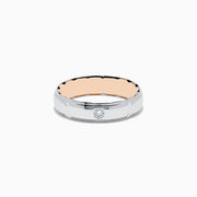 The Mens 14K Two-Tone Gold Diamond Ring features a shiny silver exterior, rose gold interior, and a central round diamond, shown on a plain white background.