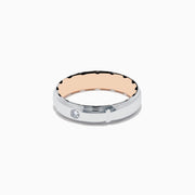 The Mens 14K Two-Tone Gold Diamond Ring features a shiny silver exterior, rose gold interior, and a central round diamond, shown on a plain white background.