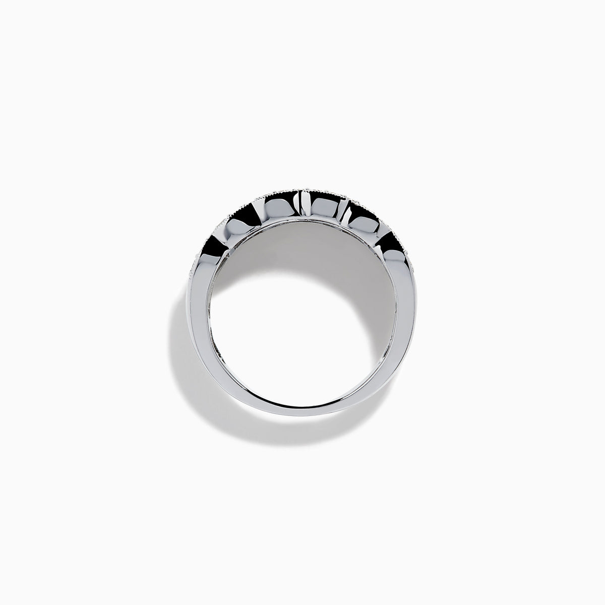 Experience timeless elegance with the 14K White Gold Diamond Multi Shape Wide Band Ring, showcasing two rows of brilliant round diamonds that border a central row of rectangular baguette-cut diamonds arranged in an intricate, repeating pattern.