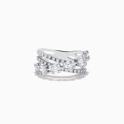 The Classique 14K White Gold Diamond Crossover Ring showcases multiple overlapping bands set with round and baguette-cut diamonds, creating an elegant sparkle against a plain white background.
