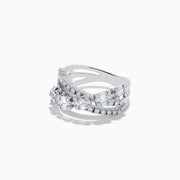 The Classique 14K White Gold Diamond Crossover Ring showcases multiple overlapping bands set with round and baguette-cut diamonds, creating an elegant sparkle against a plain white background.