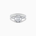 The Classique 14K White Gold Diamond Ring boasts a striking rectangular diamond cluster centerpiece, accented by smaller diamonds along the band—a sophisticated statement piece.