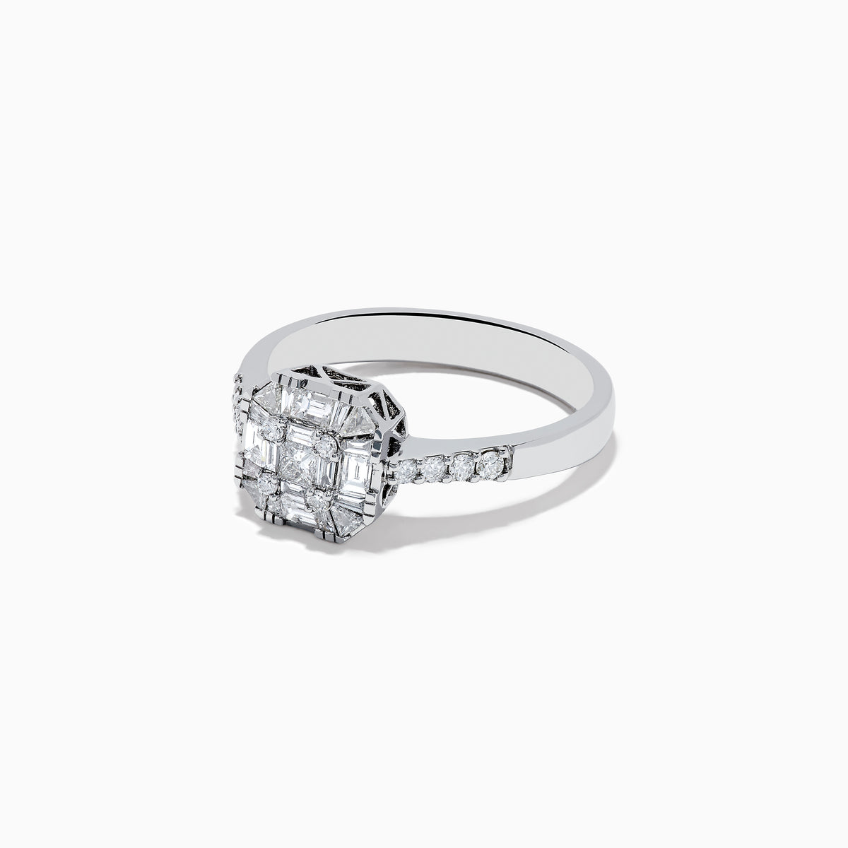 The Classique 14K White Gold Diamond Ring boasts a striking rectangular diamond cluster centerpiece, accented by smaller diamonds along the band—a sophisticated statement piece.