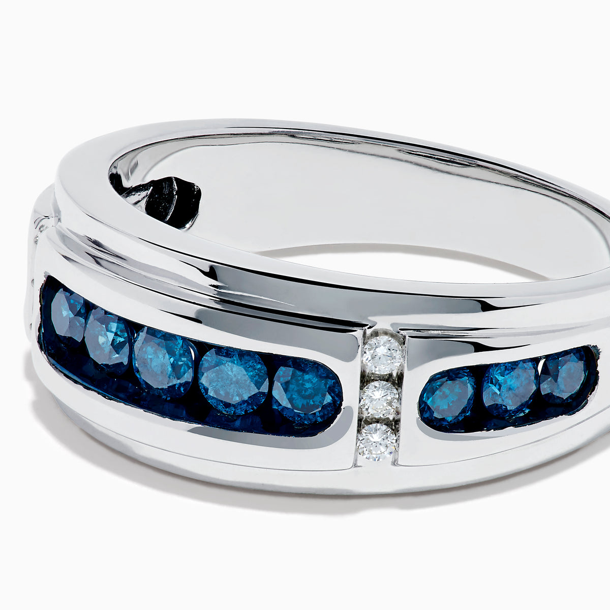 Men’s 14K White Gold Channel Set Blue and White Diamond Band featuring a row of round blue and white diamonds at the center, flanked by smaller white gems on each side, displayed on a white background.