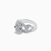 The Signature 14K White Gold Emerald and Diamond Panther Ring showcases a sculpted panther with emerald-green eyes, diamond accents, and intricate facial details, set against a plain white background.