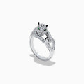 The Signature 14K White Gold Emerald and Diamond Panther Ring showcases a sculpted panther with emerald-green eyes, diamond accents, and intricate facial details, set against a plain white background.