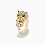 The Signature 14K Yellow Gold Diamond and Emerald Panther Ring showcases a panther’s head with diamond accents, vivid emerald eyes, and a rectangular diamond in its mouth, all set against a plain white background.