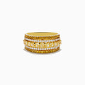 The Canare 18K Yellow Gold Yellow Diamond Band Ring features alternating rows of sparkling yellow and white gemstones set around the band.