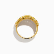 The Canare 18K Yellow Gold Yellow Diamond Band Ring features alternating rows of sparkling yellow and white gemstones set around the band.