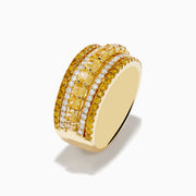 The Canare 18K Yellow Gold Yellow Diamond Band Ring features alternating rows of sparkling yellow and white gemstones set around the band.