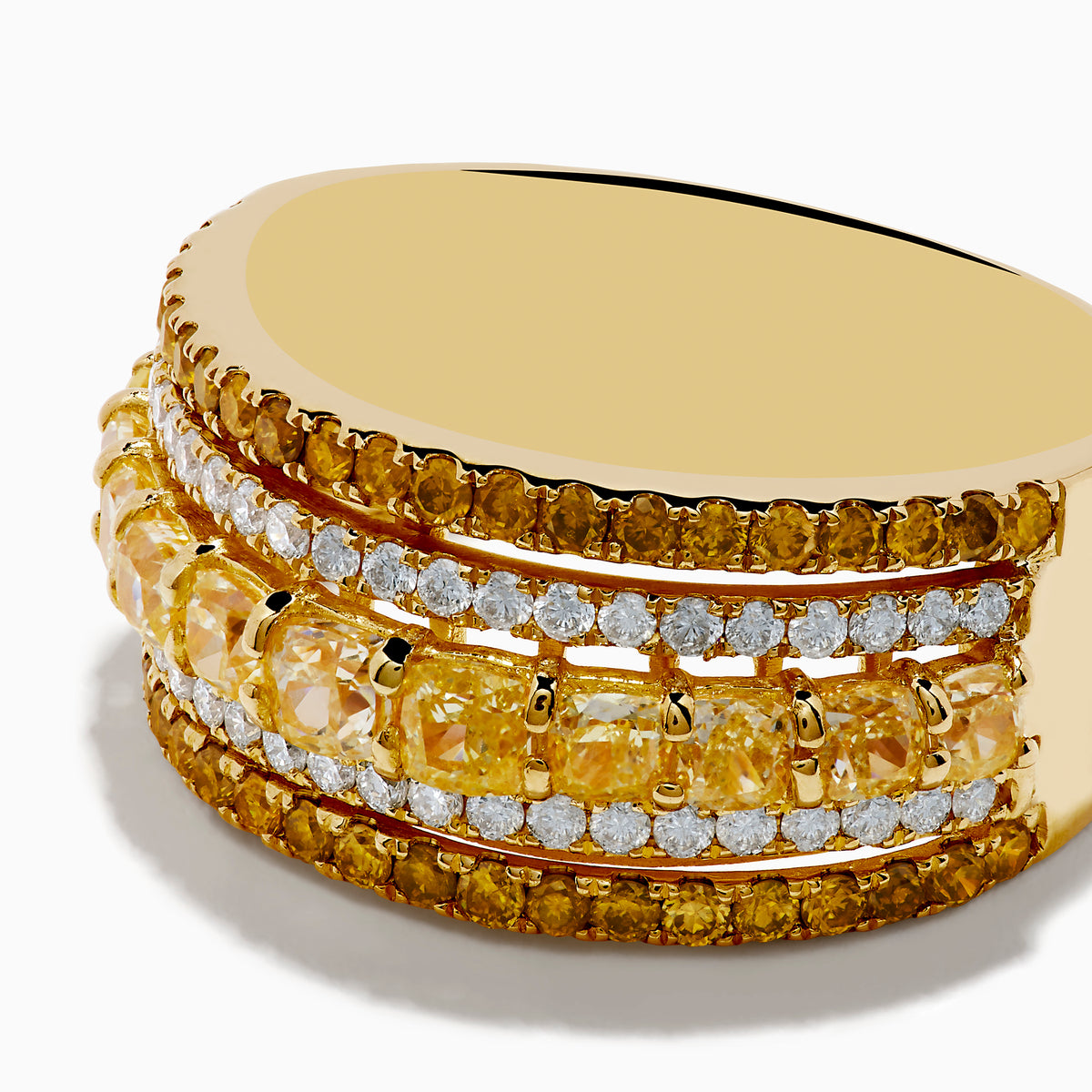 The Canare 18K Yellow Gold Yellow Diamond Band Ring features alternating rows of sparkling yellow and white gemstones set around the band.