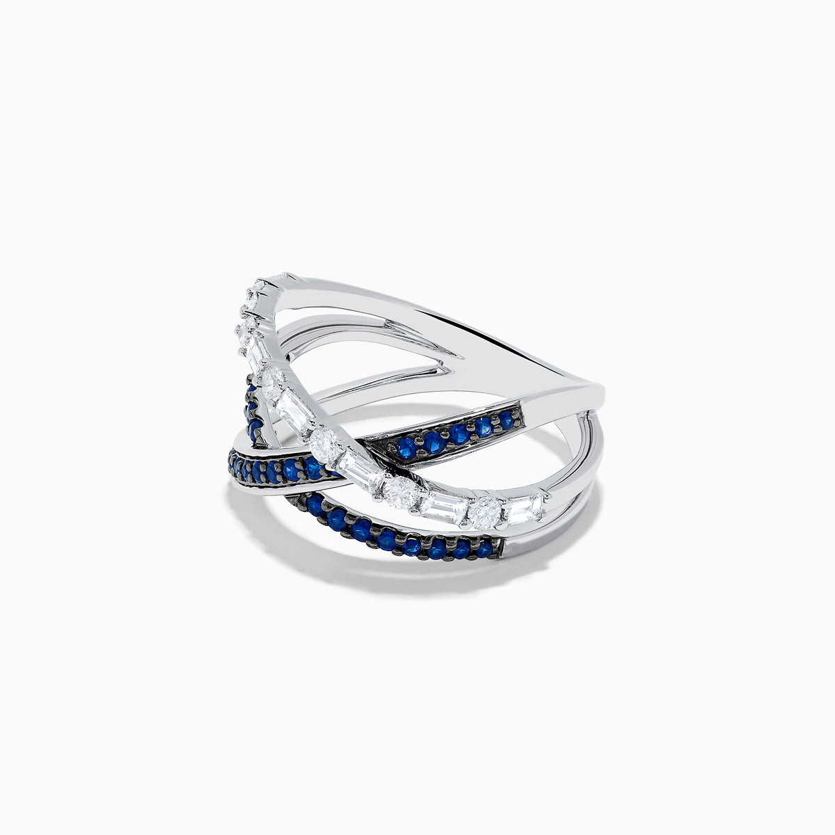 The Royale Bleu 14K White Gold Blue Sapphire and Diamond Crossover Ring features three overlapping bands—two accented with blue sapphires and one with clear rectangular diamonds—shown on a white background.