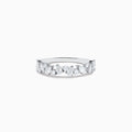 The Pave Classica 14K White Gold Multi Shape Diamond Band 0.80 TCW showcases a row of closely set mixed-shape white diamonds on a sleek white gold band, photographed against a plain white background.