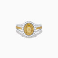 A close-up of the Canare 18K Two Tone Gold White and Yellow Diamond Ring, showcasing a yellow center stone in a halo of yellow and white diamonds on a split band with additional white and yellow diamonds.