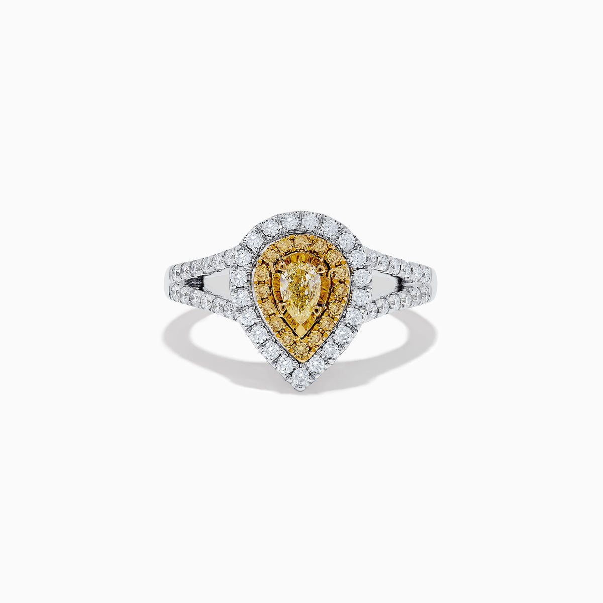 The Canare 18K Two-Tone Gold Pear Shaped Double Halo Yellow Diamond Ring features a yellow diamond with a double halo of white diamonds, set in an 18K gold band and displayed on a white background.