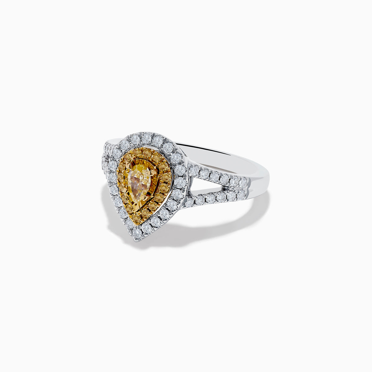 The Canare 18K Two-Tone Gold Pear Shaped Double Halo Yellow Diamond Ring features a yellow diamond with a double halo of white diamonds, set in an 18K gold band and displayed on a white background.