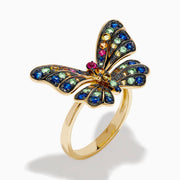 The Watercolors 14K Yellow Gold Multi Sapphire Butterfly Ring features blue, green, yellow, and pink sapphires in intricate wing patterns for a vibrant, eye-catching look.