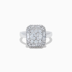 The 14K White Gold Diamond Statement Ring showcases a square-shaped setting with a cluster of round diamonds at the center, bordered by baguette-cut diamonds.