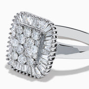The 14K White Gold Diamond Statement Ring showcases a square-shaped setting with a cluster of round diamonds at the center, bordered by baguette-cut diamonds.