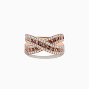 The 14K Rose Gold Espresso and White Diamond Crossover Ring features an overlapping crisscross design with rows of sparkling white and espresso diamonds set in a wide band.