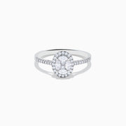 The Classique 14K White Gold Diamond Cluster Ring features an oval center diamond haloed by smaller diamonds, plus additional diamonds along its elegant band.