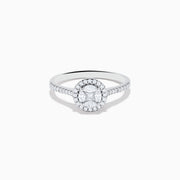 The Bouquet 14K White Gold Diamond Cluster Ring features an oval center diamond with a halo of smaller diamonds and a diamond-studded band, beautifully displayed against a plain white background.