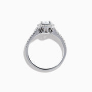 The Bouquet 14K White Gold Diamond Cluster Ring features an oval center diamond with a halo of smaller diamonds and a diamond-studded band, beautifully displayed against a plain white background.