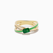 The Brasilica 14K Yellow Gold Emerald and Diamond Crossover Ring features a rectangular emerald center, crisscrossing diamond-accented bands, and a green enamel stripe.