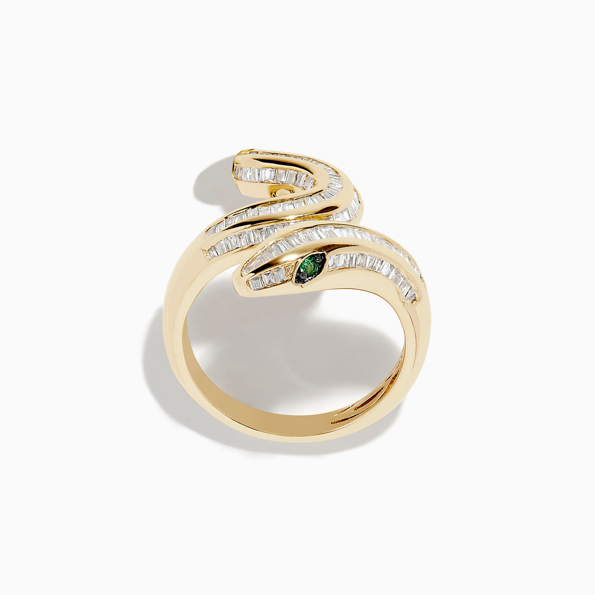 The Safari 14K Yellow Gold Emerald and Diamond Snake Ring features baguette-cut diamonds along its body and two emerald gemstones for eyes, shown on a white background.