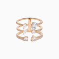 The Pave Rose 14K Rose Gold Diamond Ring features four open bands adorned with pavé diamonds and assorted clear gemstones—including teardrop and rectangular cuts—for an elegant, multi-layered look.