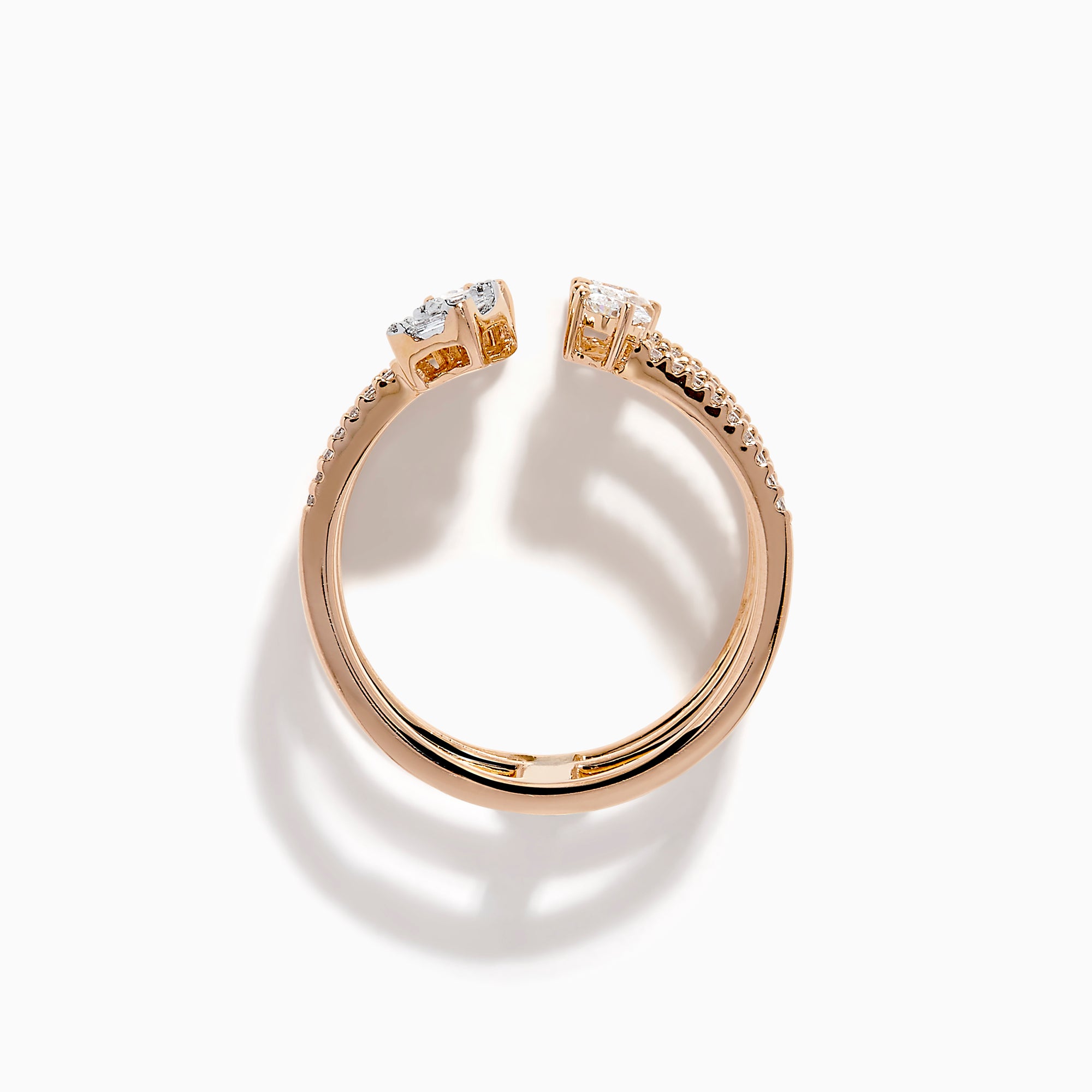 The Pave Rose 14K Rose Gold Diamond Ring features four open bands adorned with pavé diamonds and assorted clear gemstones—including teardrop and rectangular cuts—for an elegant, multi-layered look.