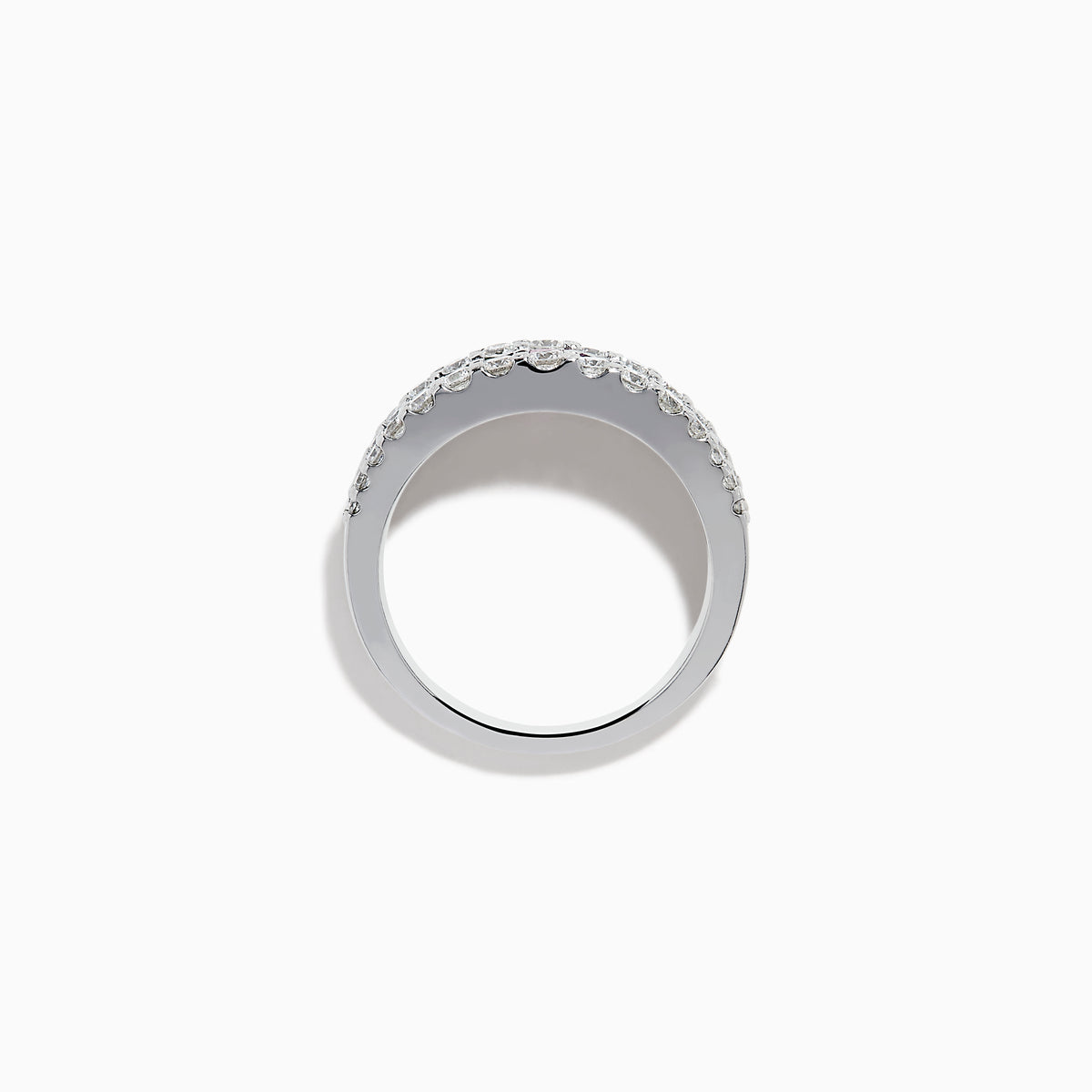 The Watercolors 14K White Gold Channel Set Multi Sapphire and Diamond Band showcases vibrant square-cut sapphires in a rainbow of colors, framed by sparkling round diamonds for a dazzling, colorful statement piece.