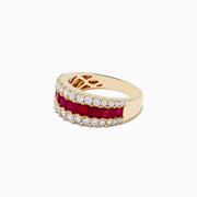 The Ruby Royale 14K Yellow Gold Princess Cut Ruby & Diamond Band features two rows of round white diamonds and a central row of princess-cut rubies, elegantly set on a white background.