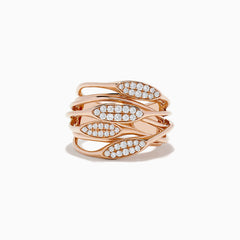 The 14K Rose Gold Diamond Fashion Ring features five overlapping leaf-shaped bands, each set with sparkling white diamonds. Its open spaces and sleek design create a modern, elegant style.