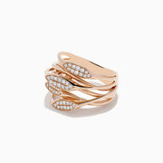 The 14K Rose Gold Diamond Fashion Ring features five overlapping leaf-shaped bands, each set with sparkling white diamonds. Its open spaces and sleek design create a modern, elegant style.