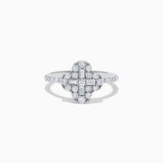 The Classique 14K White Gold Diamond Ring showcases a clover-shaped cluster of round and baguette diamonds on a slim, diamond-studded band, set against a white background.