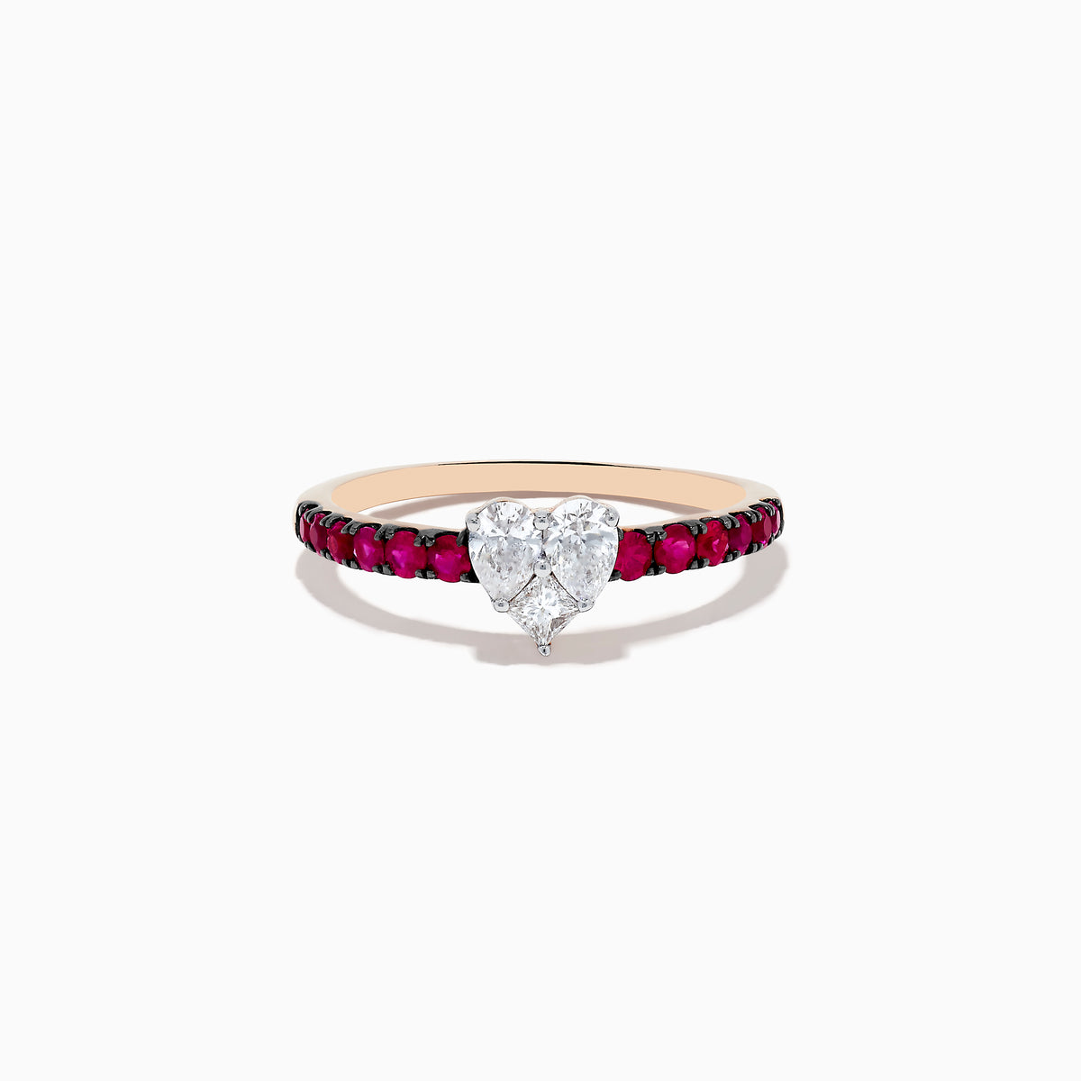 The 14k Rose Gold Ruby and Diamond Heart Ring features a heart-shaped diamond center and a band adorned with small rubies, showcased from the front on a white background.