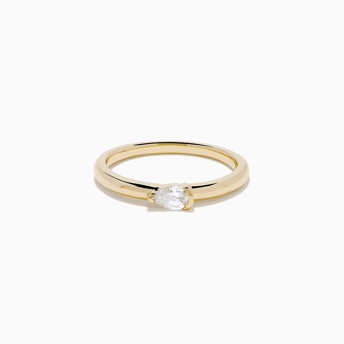 The D'Oro 14K Yellow Gold Diamond Ring showcases a single round-cut diamond solitaire in a minimalist prong setting, presented on a white background.
