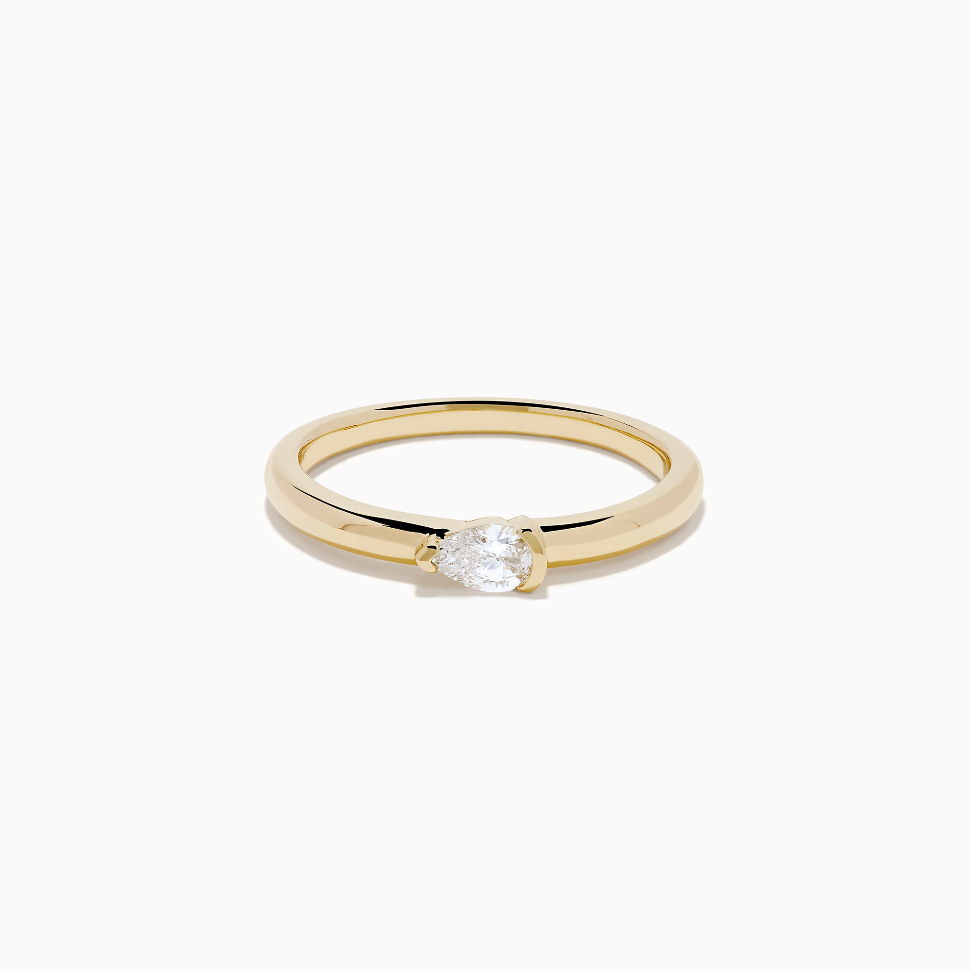 The D'Oro 14K Yellow Gold Diamond Ring showcases a single round-cut diamond solitaire in a minimalist prong setting, presented on a white background.