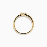 The D'Oro 14K Yellow Gold Diamond Ring showcases a single round-cut diamond solitaire in a minimalist prong setting, presented on a white background.