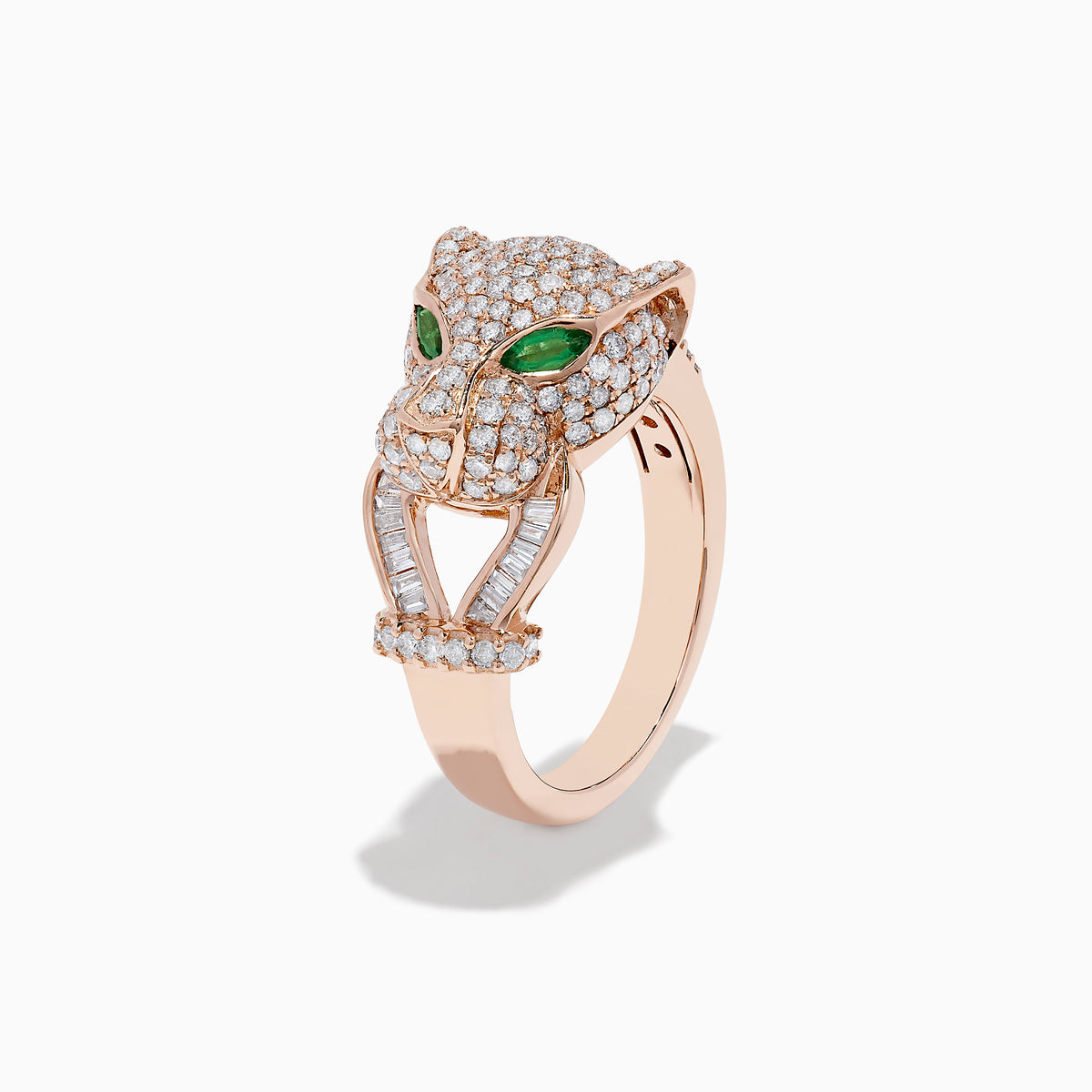 The Signature 14K Rose Gold Emerald and Diamond Panther Ring features a panther’s head with diamond accents, emerald-green gemstone eyes, and two curved diamond-studded bands held in its mouth.