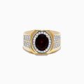 The Mens 14K Yellow Gold Garnet and Diamond Ring features a central oval garnet, haloed by diamonds with rows of clear stones on the wide band—a bold, elegant Effy design.