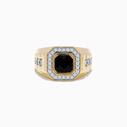 The Mens 14K Yellow Gold Onyx and Diamond Ring features a bold rectangular onyx centerpiece, framed by clear diamonds and accented with additional diamonds on the band for extra brilliance.