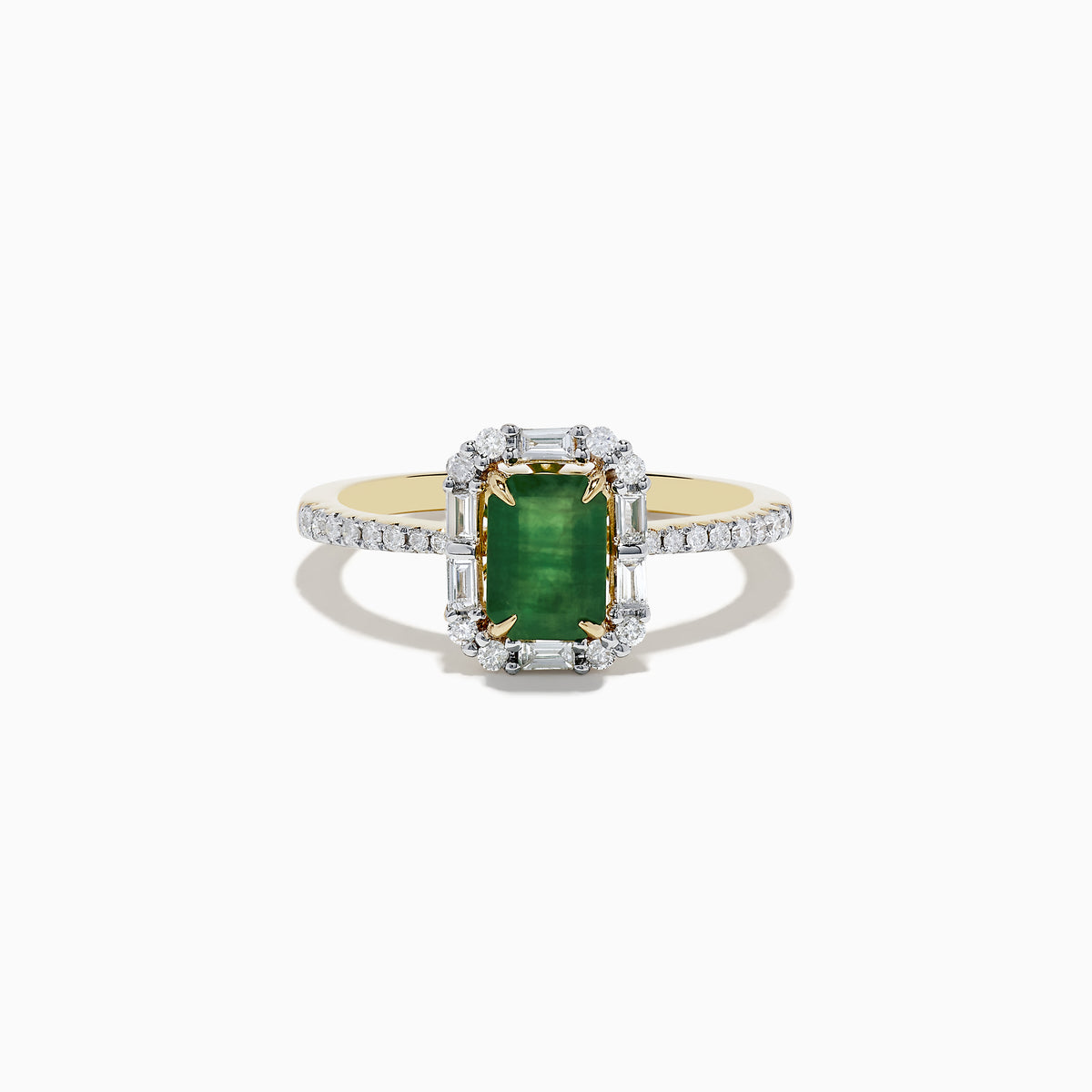 The 14K Yellow Gold Emerald and Diamond Ring features an emerald-cut green gemstone at the center, surrounded by round diamonds and enhanced with additional diamonds on the band.