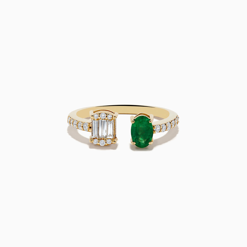 The 14K Yellow Gold Emerald and Diamond Toi Et Moi Ring features a row of diamonds on the band, an emerald-cut diamond cluster on one side, and a striking green oval emerald gemstone on the other.
